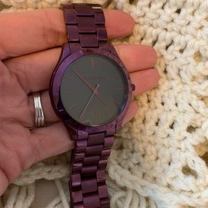 Michael Kors purple watch.
